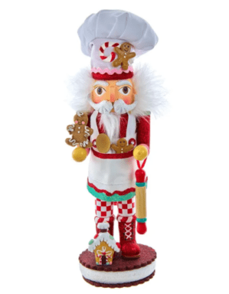 This Gingerbread Chef Nutcracker Hollywood Nutcrackers™ features a gingerbread chef showing off his creations for the holiday season.