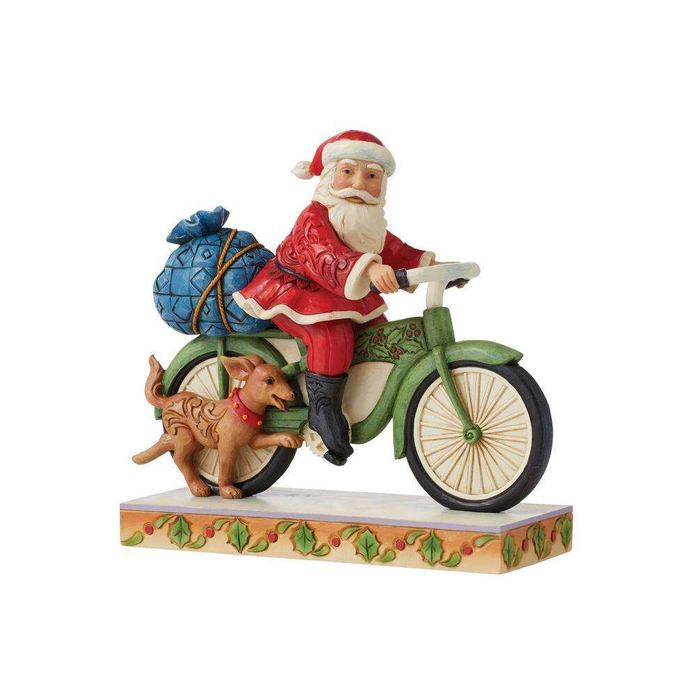 Santa Riding Bicycle by Jim Shore